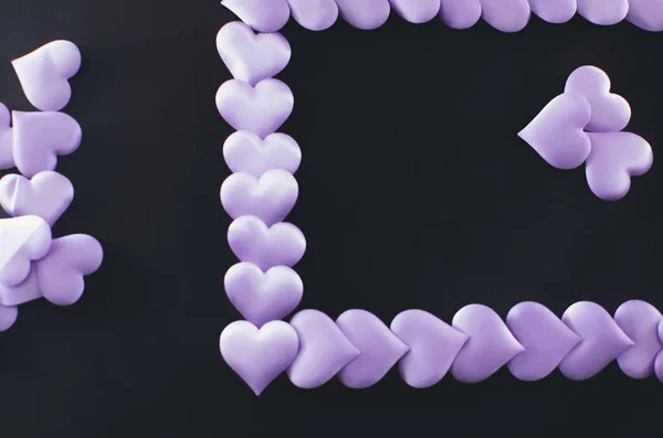 Many purple hearts shaped frames