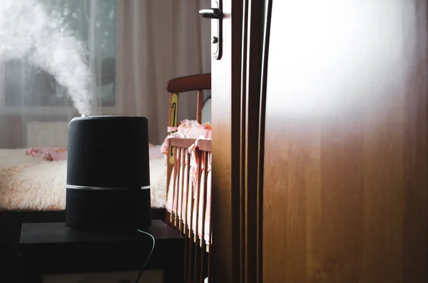 The steam from the humidifier night in a child's bedroom