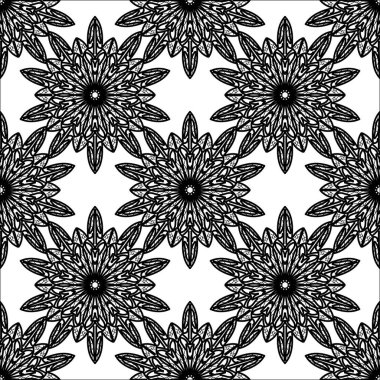 Siyah bir fırçayla yapılmış büyük çiçek şeklinde mandala deseni.