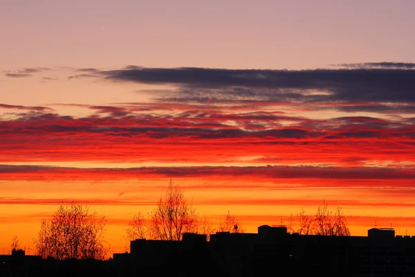 red-orange sky over the city after sunset