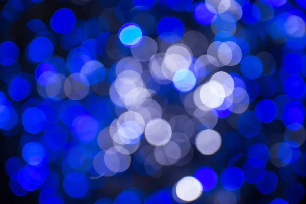 Glittering stars on bokeh. Christmas background — Stock Photo, Image