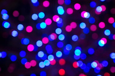 Bokeh 'te parıldayan yıldızlar. Noel arkaplanı