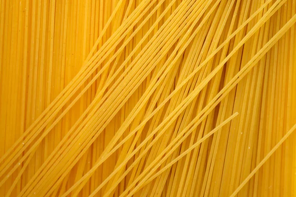 Nce Spagetti Arkaplan Manzaralı Pişmemiş Çiğ Spagetti — Stok fotoğraf