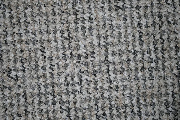 Carpet for the floor in the office. Gray synthetic carpet background. Felt carpet top view texture.