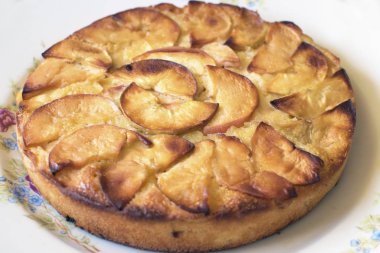Delicious apple pie cooked at home. A recipe for homemade baking with apples. a close-up dish 