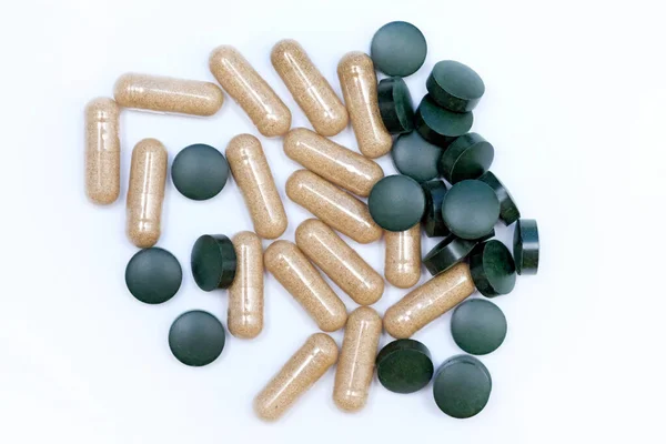 Green Pills Capsules Top View Food Supplements Tablets Aloe Chlorella — Stock Photo, Image