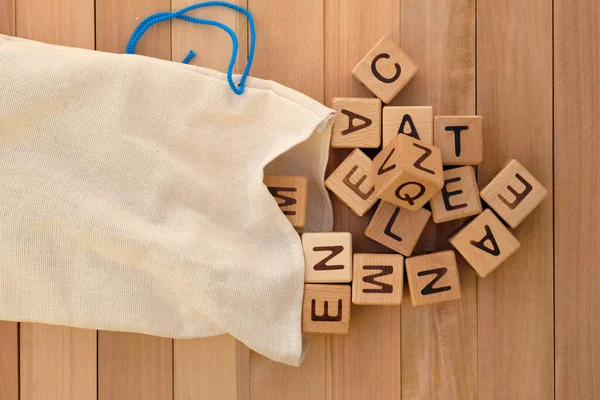 Cloth Bag Wooden Cubes Top View Wooden Cubes Letters English — Stock Photo, Image