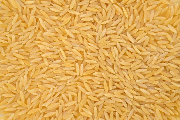 Italiensk Pasta Orzo Bakgrund Ovanifrån Närbild Hård Pasta Form Litet — Stockfoto