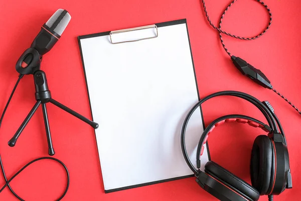 Headphones Microphone Clipboard White Paper Red Background Concept Music Podcast — Stock Photo, Image