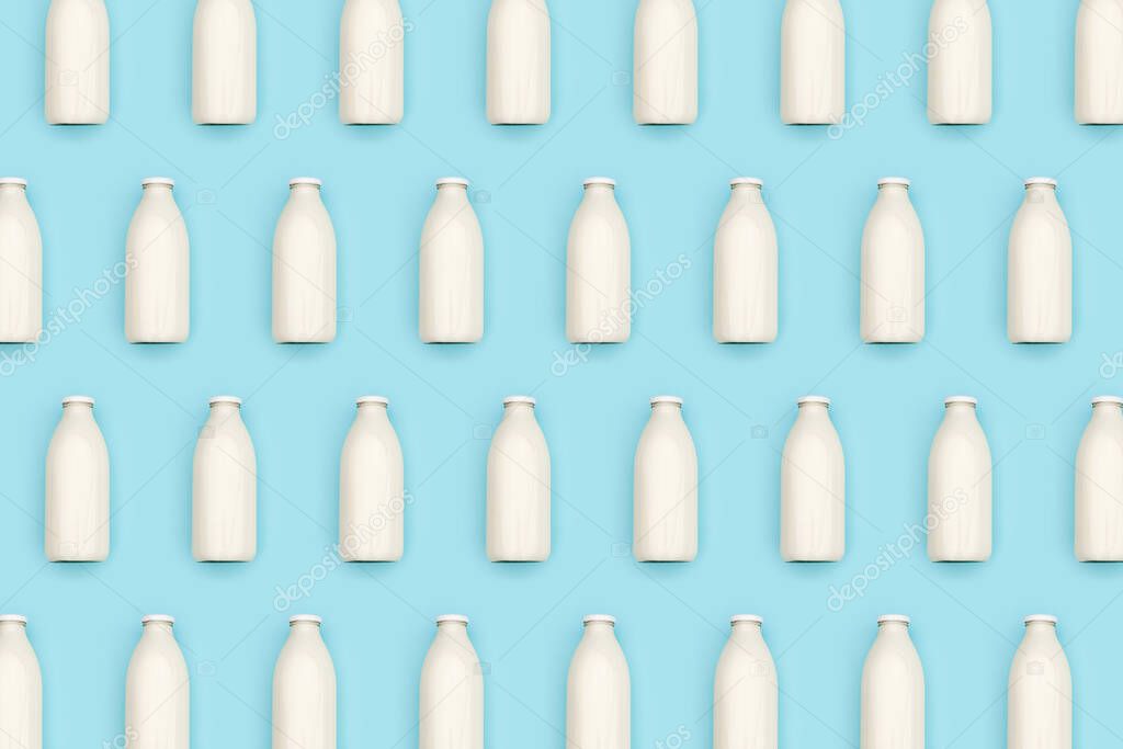 Pattern made with transparent glass bottle of milk on blue background. Flat lay Top view.