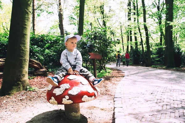 Family is having fun at amusement park Efteling, Netherlands.