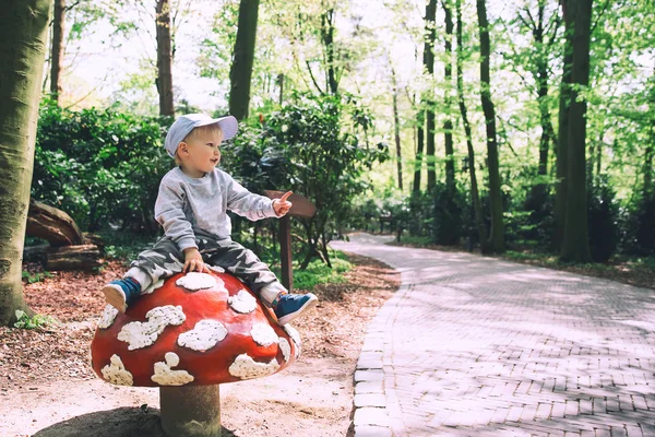 Family is having fun at amusement park Efteling, Netherlands.