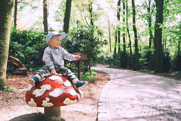 Family is having fun at amusement park Efteling, Netherlands.