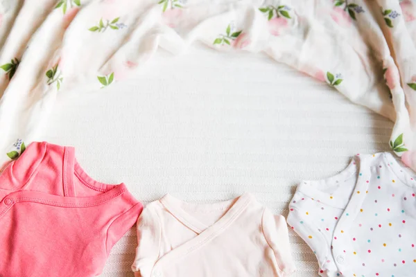 Baby girl clothes. Fabric background. — Stock Photo, Image