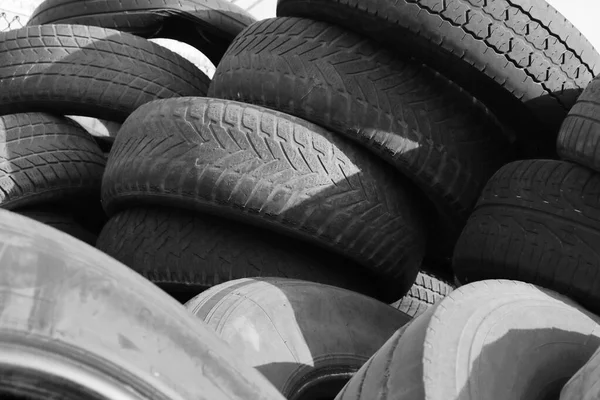old tires in a dump waiting for recycling texture background