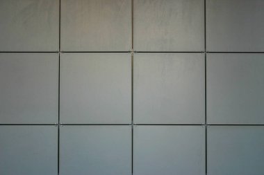 texture: a fragment of a square-tiled wall