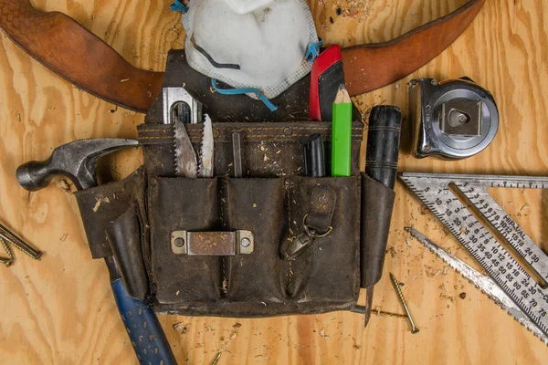 Real Used Carpentry Tools and Leather Tool Belt Flat Lay ストック画像