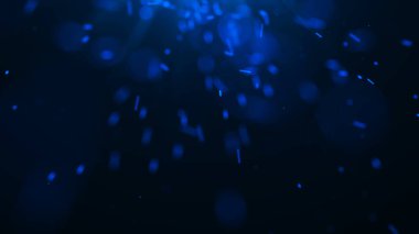 Uçan kıvılcımlar. Kıvılcımlar saçar. Bulanık parlak ışık.