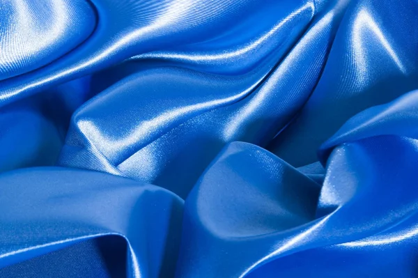 Arka plan mavi bir kumaş ile — Stok fotoğraf