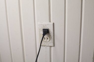 Plugged In to the Wall Socket clipart