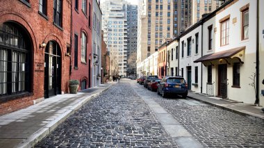 Washington Mews is a short street with European architecture connecting Fifth Avenue to University Place in Manhattan clipart