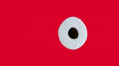 Toilet paper roll on various bright solid color backgrounds.