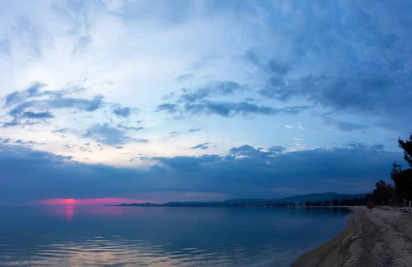 The waterfront of Nikiti in Chalkidiki, Greece, at dusk — Stock Photo, Image