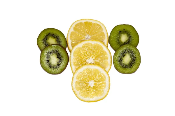 Kiwi and lemon circles on a white background — Stock Photo, Image
