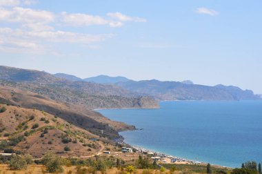 Beautiful view of the sea and mountains from the shore. Crimea