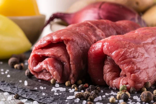 Couple of beef slices prepared for roulade