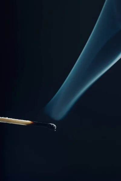 Match stick with burnt head and smoke around — Stock Photo, Image