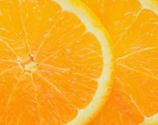 Orange fruit slice closed up food background