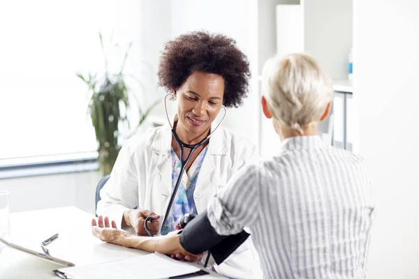 Afro american woman doctor in hospital work place
