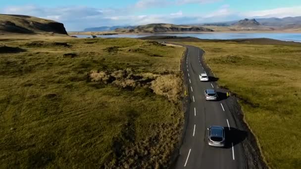 REYKJAVIK, ICELAND, OCTOBER 10, 2019 Four Hyundai Tucson cars drive off the road over the horizon — Stock Video
