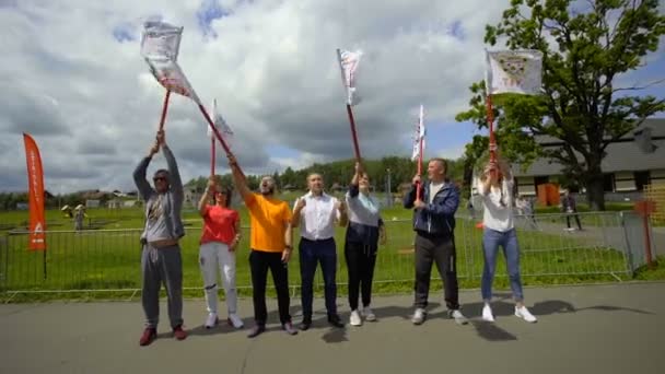 SILICHY, BELARUS - 2, AUGUST, 2019: Alfabank, Conte. A group of guys waving the flags of their teams — Stock Video