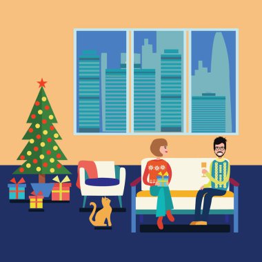 Noel odası kanepe çift evde oturan.