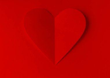 Red paper heart on a red background. Valentine's Day. Valentine's Day. Love and heart