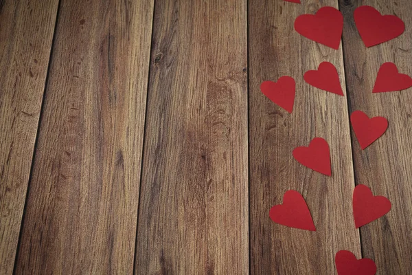 Background for Valentine's Day. Hearts on a wooden background. Valentine — Stock Photo, Image