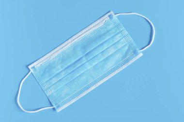 Cerrahi tıbbi maske. Ağzı ve burnu bakterilerden ve virüsten korumak için maske..