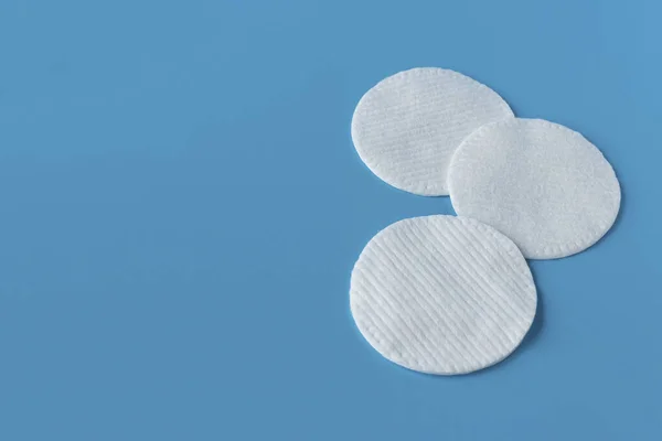 Cotton pads for skin care, for cleansing the face of cosmetics with tonic or micellar cleansing water. Cosmetic products