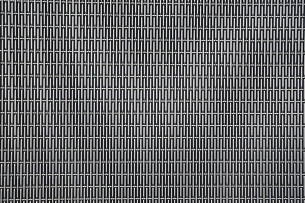 Arka plan sayfası özet satırları ve delikleri ile kaplı metal