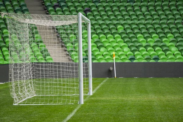 Football, soccer field. Soccer goal. Background of soccer football goal in stadium on match day