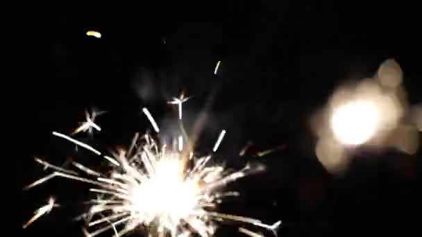 Firework sparkler burning in macro shot — Stock Video