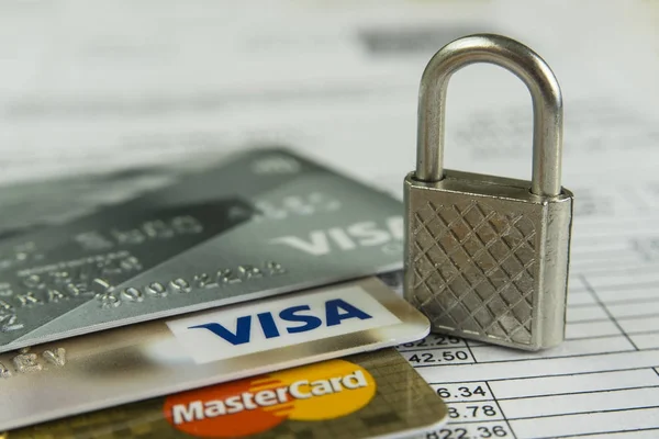 Krasnodar, Russia - October 30, 2017 : Protection of credit Visa and Master cards against hacker attacks. — Stock Photo, Image