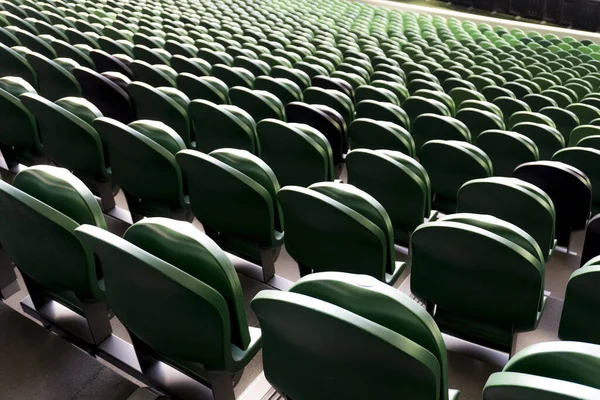 Empty plastic seats in a stadium. Matches to be played without fans. — Stock Photo, Image