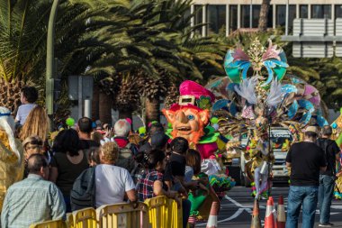 SANTA CRUZ DE TENERIFE, SPAIN - FEBRUARY 25, 2020: Coso parade - along the Avenida de Anaga, official end of Carnival. Again march carnival groups, floats, decorated cars and the Carnival Queens.