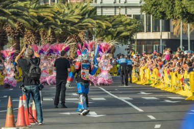SANTA CRUZ DE TENERIFE, SPAIN - FEBRUARY 25, 2020: Coso parade - along the Avenida de Anaga, official end of Carnival. Again march carnival groups, floats, decorated cars and the Carnival Queens.