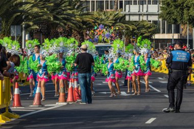 SANTA CRUZ DE TENERIFE, SPAIN - FEBRUARY 25, 2020: Coso parade - along the Avenida de Anaga, official end of Carnival. Again march carnival groups, floats, decorated cars and the Carnival Queens.