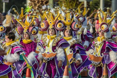 SANTA CRUZ DE TENERIFE, SPAIN - FEBRUARY 25, 2020: Coso parade - along the Avenida de Anaga, official end of Carnival. Again march carnival groups, floats, decorated cars and the Carnival Queens.