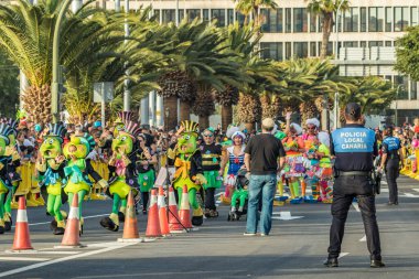SANTA CRUZ DE TENERIFE, SPAIN - FEBRUARY 25, 2020: Coso parade - along the Avenida de Anaga, official end of Carnival. Again march carnival groups, floats, decorated cars and the Carnival Queens.